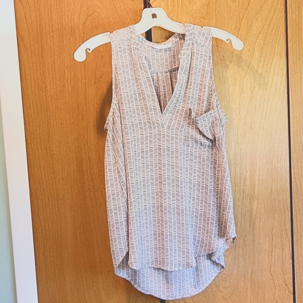 Blush size Small, Sleeveless V Neck blouse